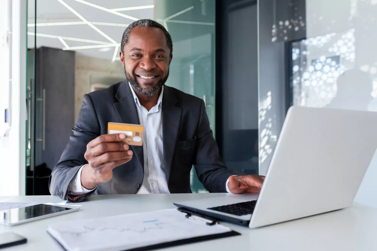 Bank employee smiling young african american man 2025 03 26 09 15 13 utc